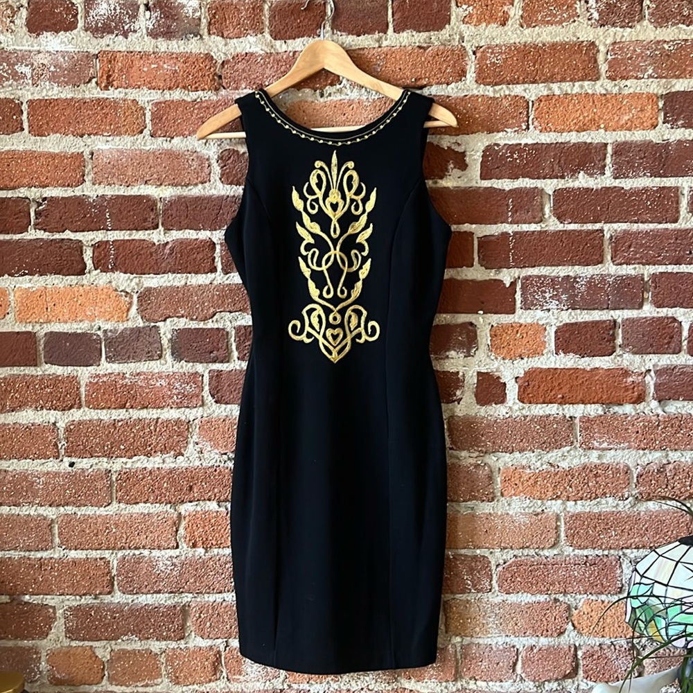 Show stopping form fitting cocktail dress